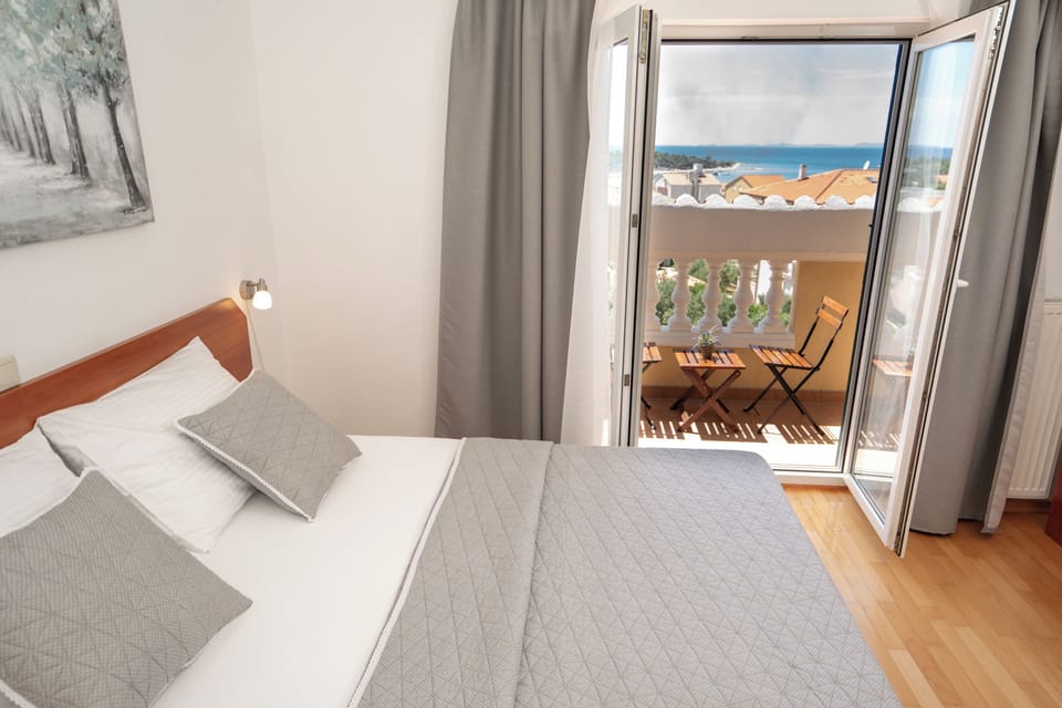 Standard Double Room, Balcony | Down comforters, minibar, in-room safe, desk