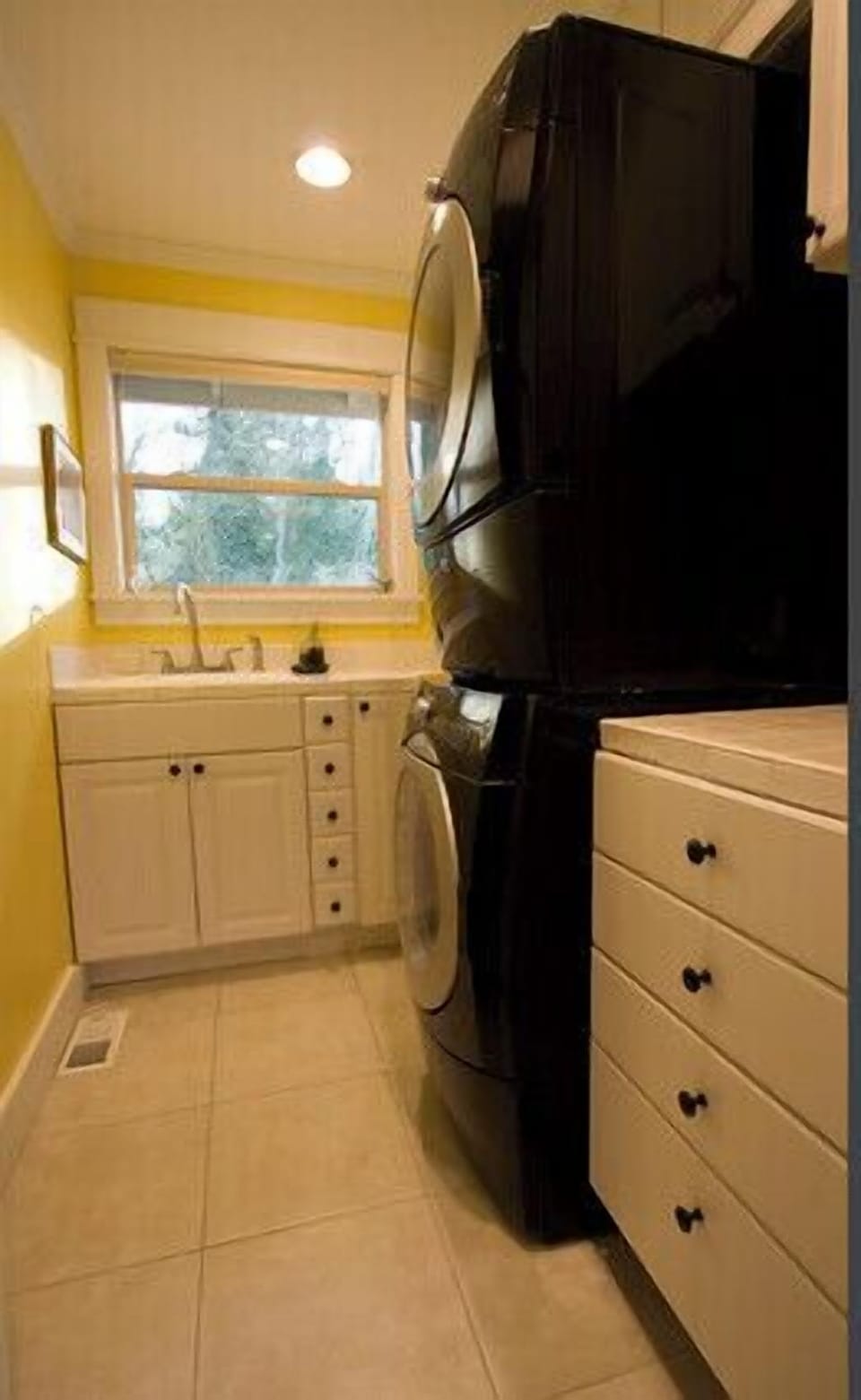Contemporary high capacity washer and dryer available for your use.