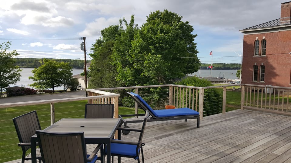 Beautiful deck overlooking lawn and Sheepscot River.
