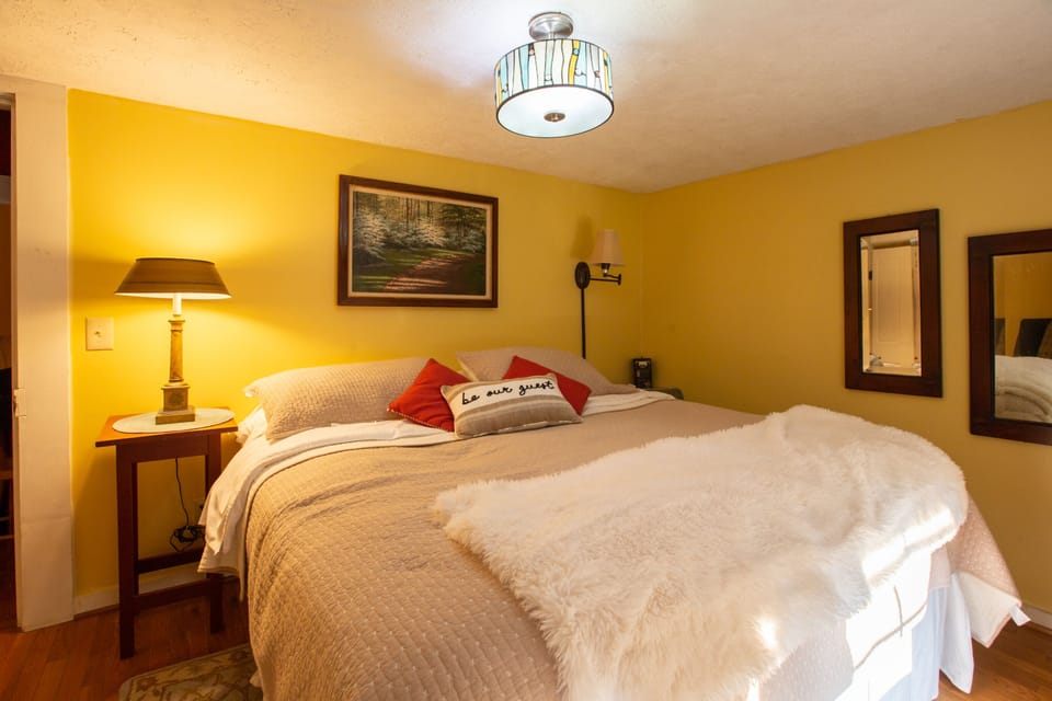 The master bedroom has a comfy king bed with a pillow top.