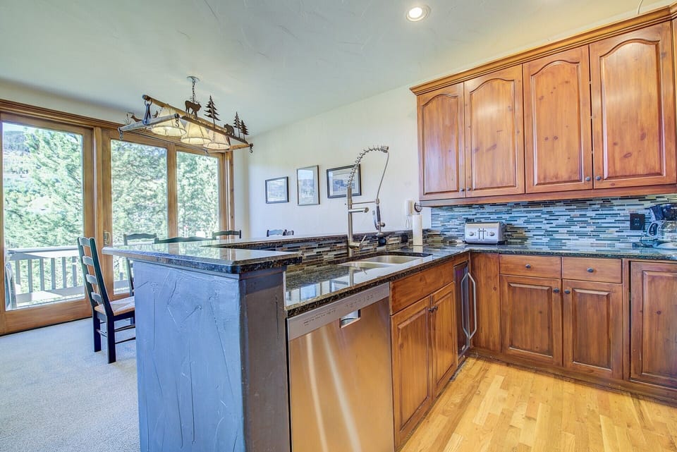 Kitchen with a beverage cooler and views