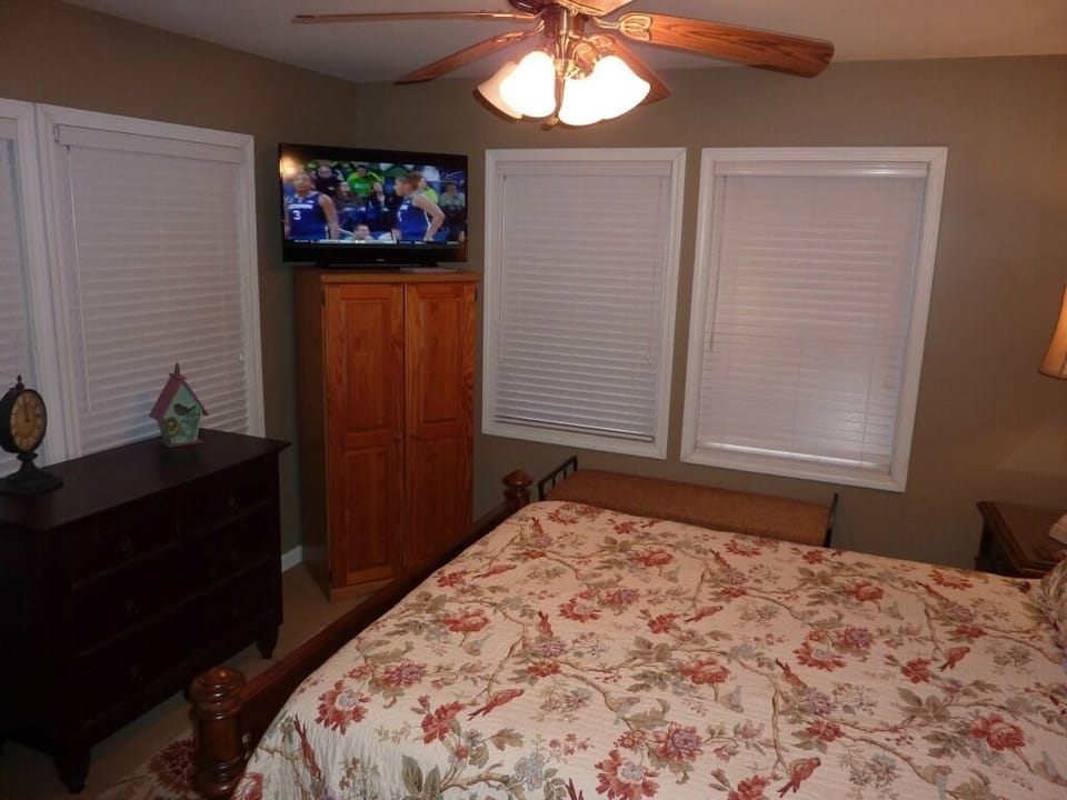 Other view of upstairs bedroom with 40 inch flat screen television.