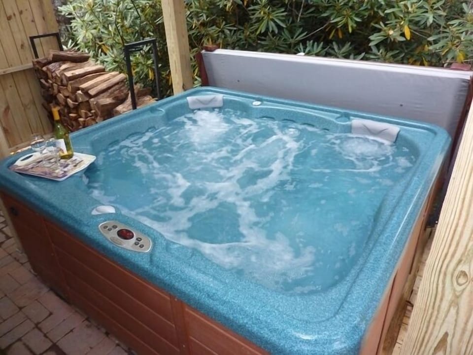 Hot tub outside bedroom downstairs