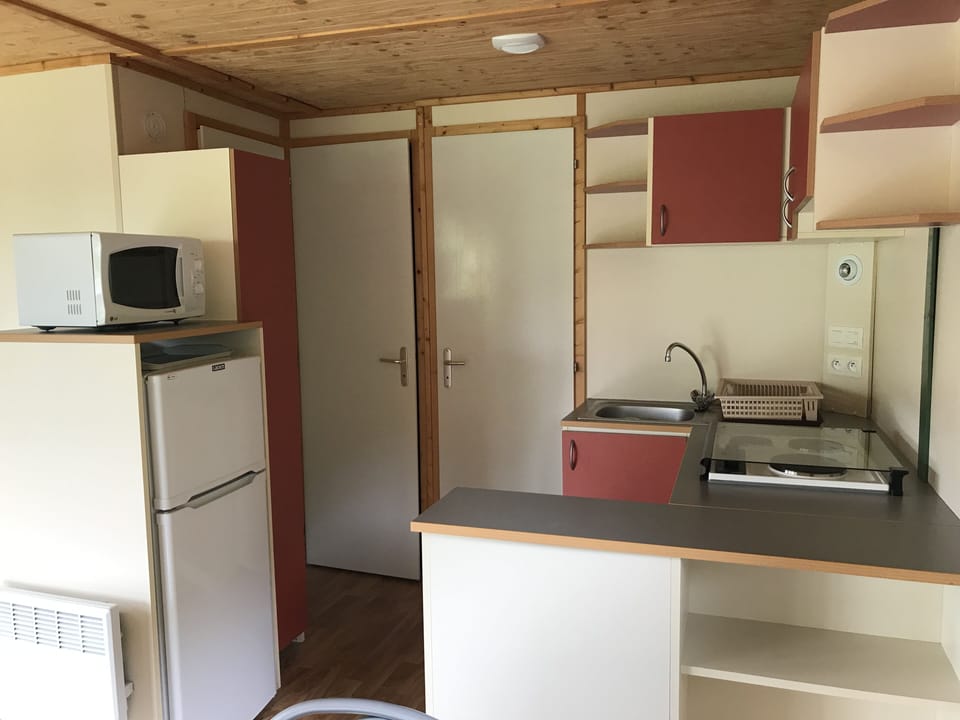 Family Chalet, 2 Bedrooms | Private kitchen | Coffee/tea maker, full-size fridge, microwave, stovetop