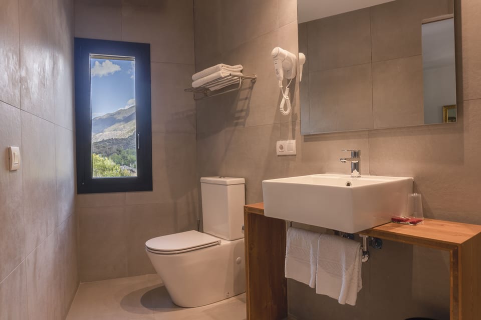 Quadruple Room | Bathroom | Shower, bidet, towels