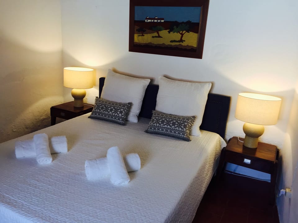 Room 3 has one double bed, a closet and a writing desk.
