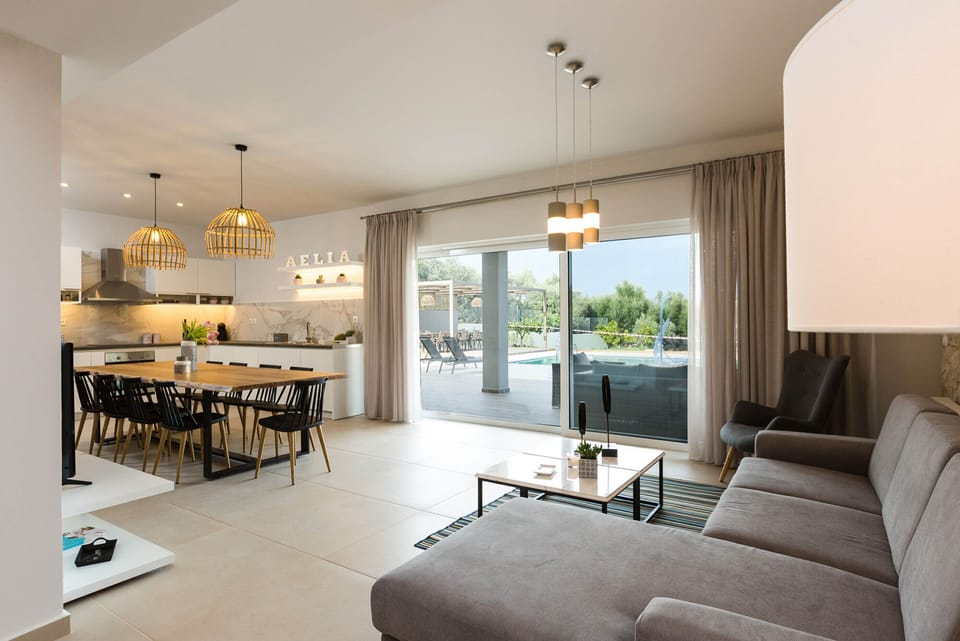 Superior Villa, 6 Bedrooms, Private Pool | Living area | Flat-screen TV, fireplace, books, video library