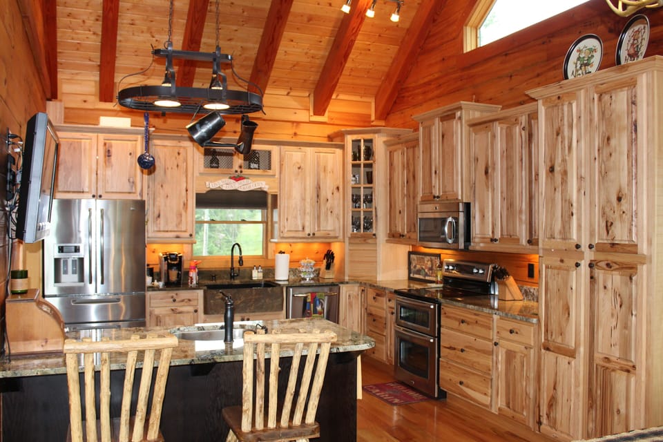 Beautiful Kitchen with bar and amazing hickory cabinets