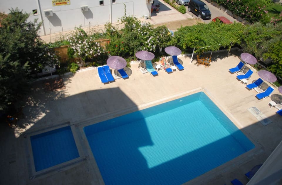 Seasonal outdoor pool, pool umbrellas, sun loungers