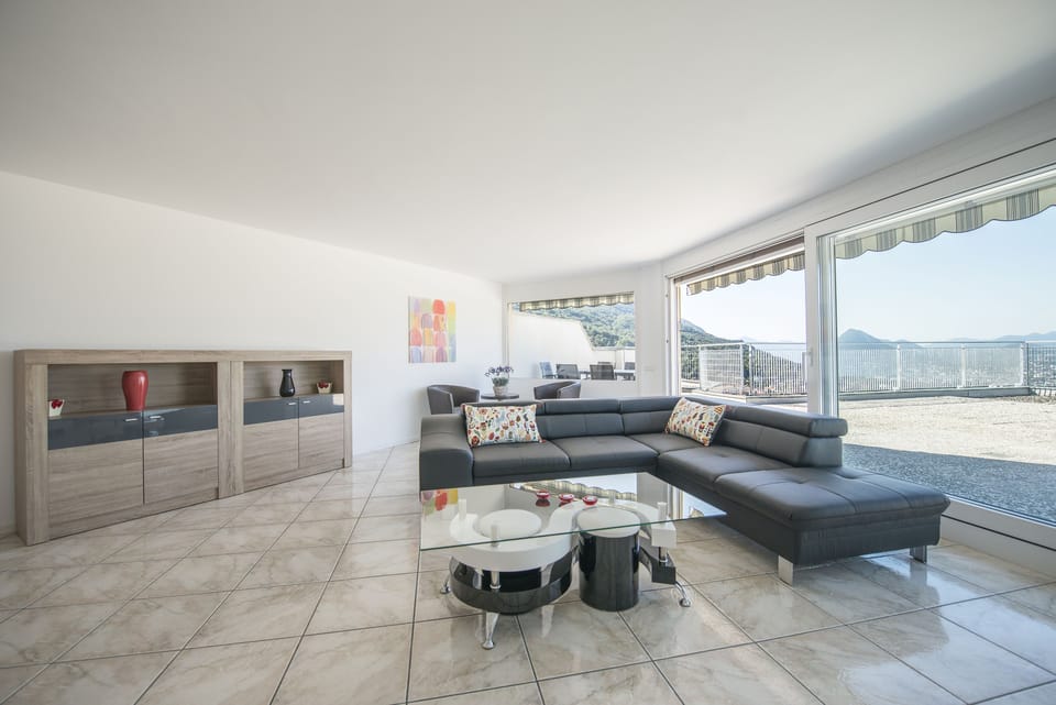 Panoramic Penthouse, 3 Bedrooms, Lakeside | Living area | TV, heated floors