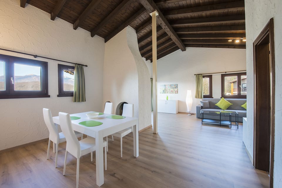 Apartment, 1 Bedroom | Living area | TV, heated floors