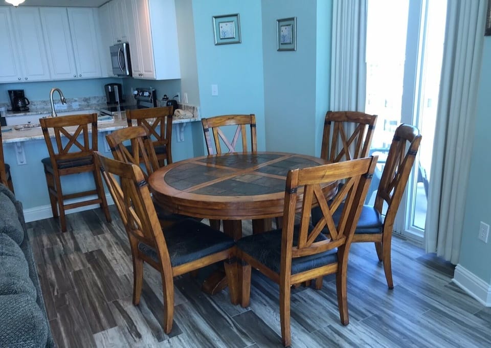 Dining table will seat six, plus 3 at bar!