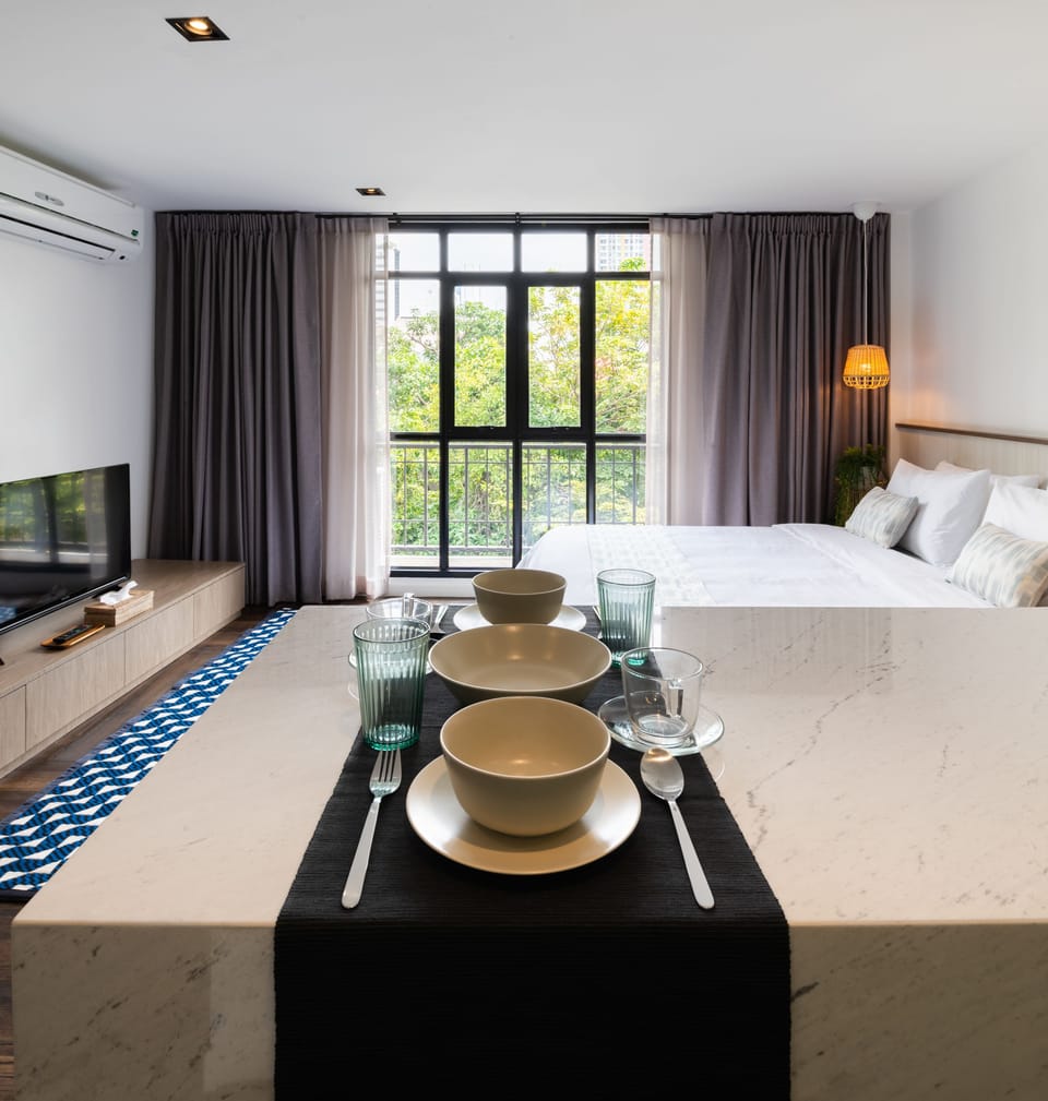 Private Room with Partially Open Bathroom | In-room safe, iron/ironing board, free WiFi, bed sheets