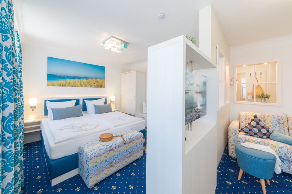 Premium Double Room | Living area | Flat-screen TV