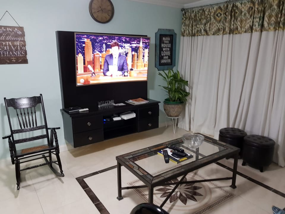City Apartment, 2 Bedrooms | Living area | 50-inch flat-screen TV with cable channels, TV, DVD player