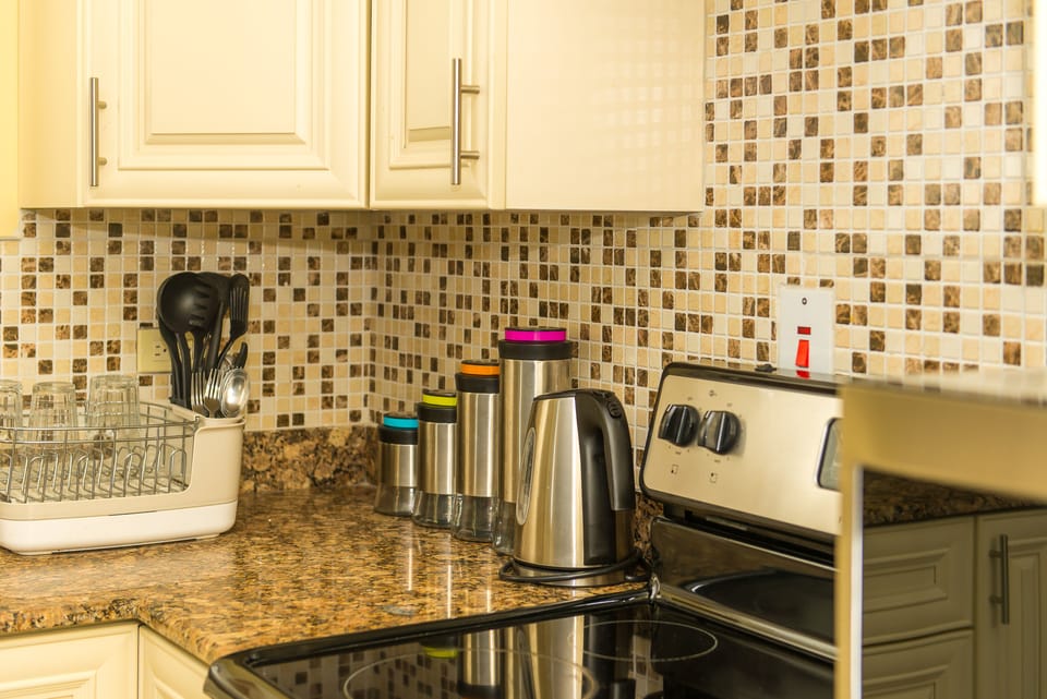 Luxury Apartment, Pool View | Private kitchen | Full-size fridge, microwave, oven, stovetop