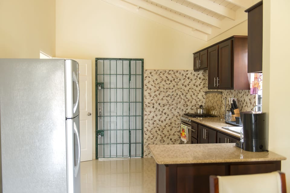 Family Villa, 2 Bedrooms | Private kitchen | Coffee/tea maker, full-size fridge, microwave, oven