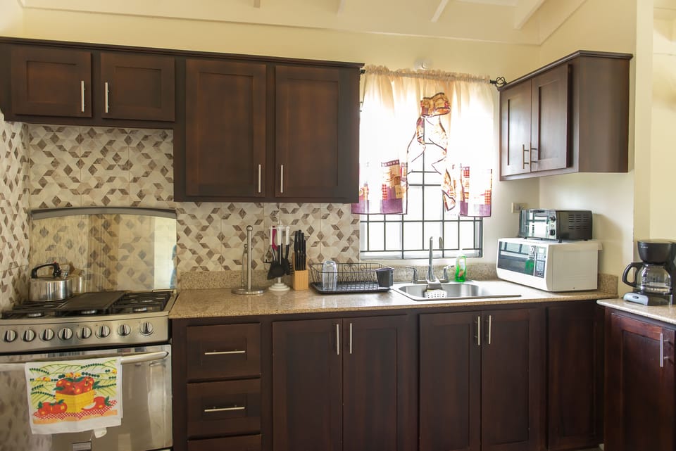 Family Villa, 2 Bedrooms | Private kitchen | Coffee/tea maker, full-size fridge, microwave, oven