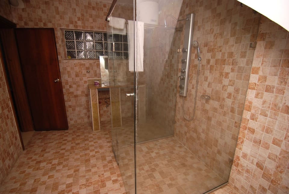 Presidential Suite, 1 Double Bed | Bathroom | Shower, rainfall showerhead, free toiletries, towels