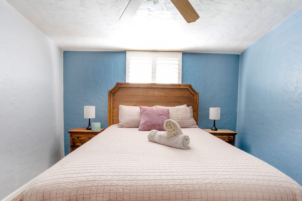 Bedroom 2, Queen Bed and dresser as well as closet for your hanging goods.