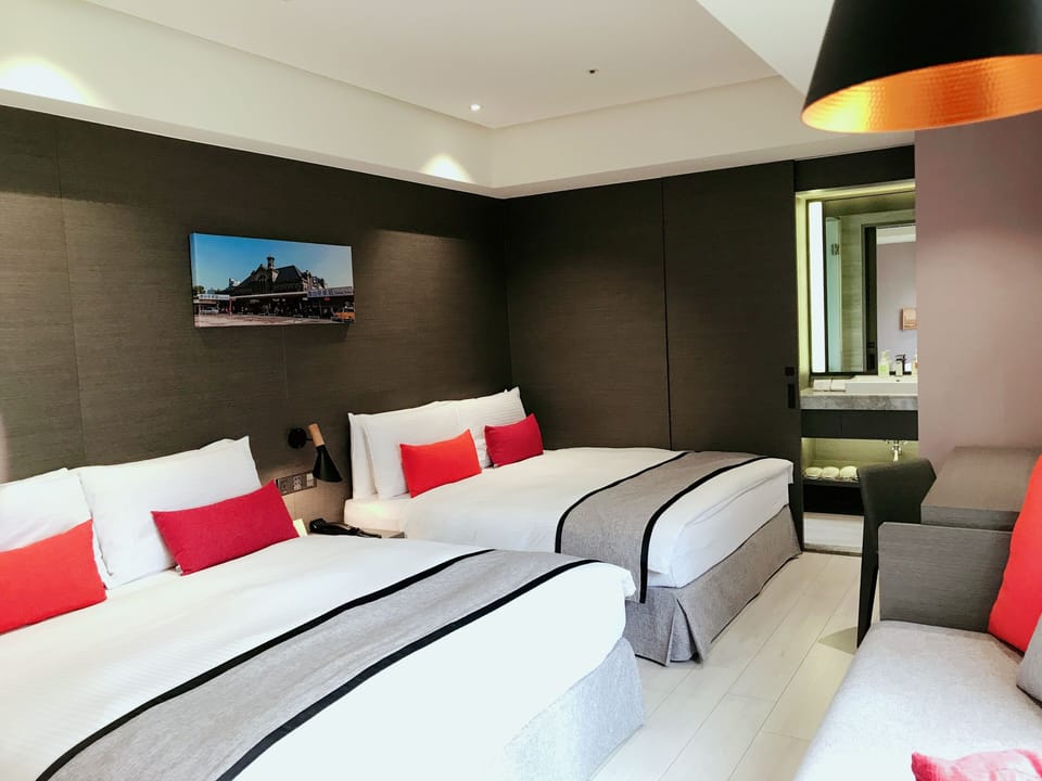Deluxe Quadruple Room | Down comforters, in-room safe, desk, free WiFi