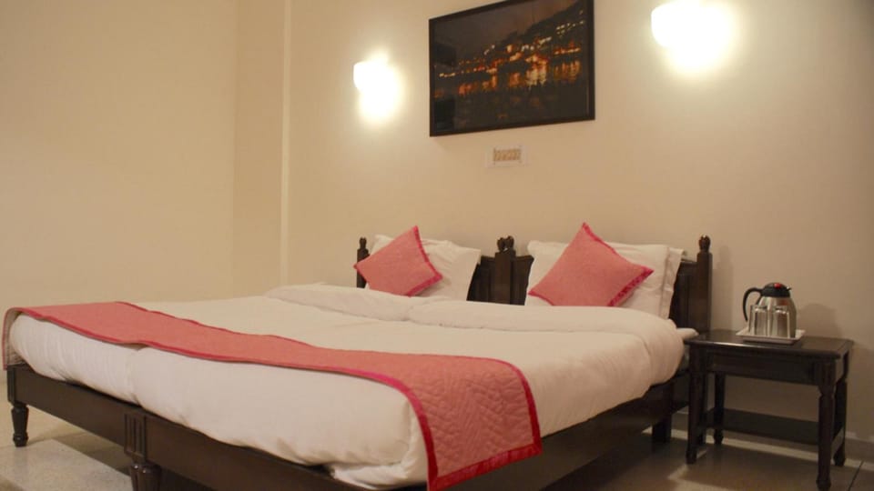 Desk, blackout drapes, iron/ironing board, rollaway beds