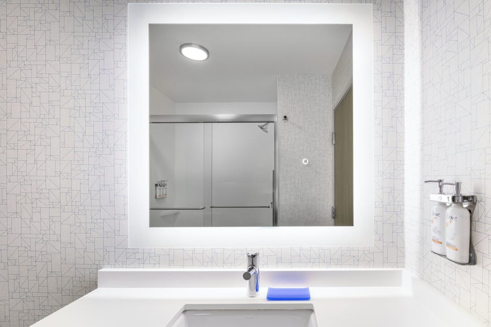 Eco-friendly toiletries, hair dryer, towels