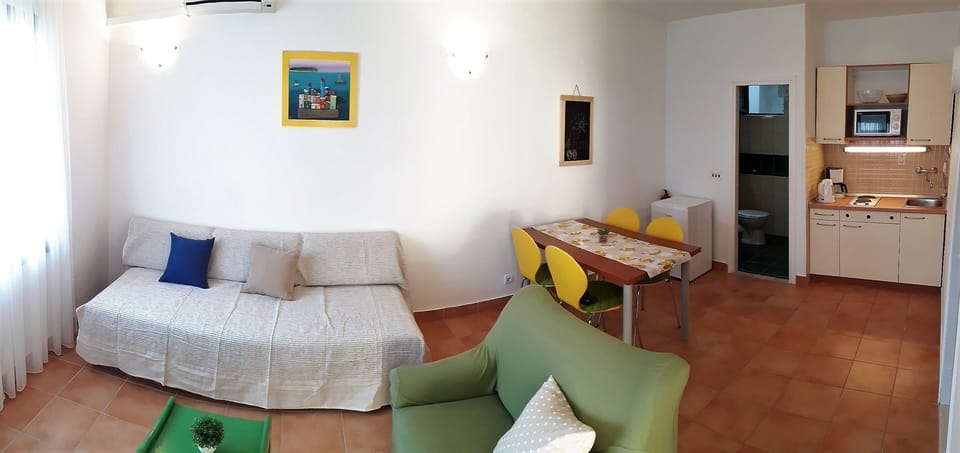 Economy Apartment, 1 Bedroom | Living area | LCD TV