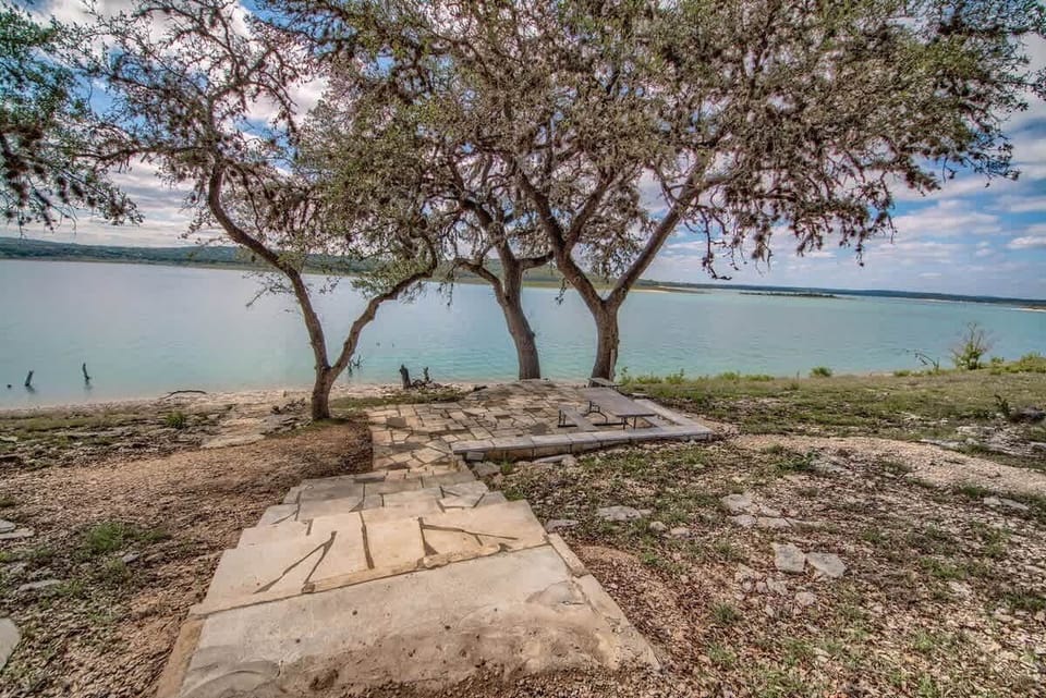 Steps down to picnic area from the cottage.