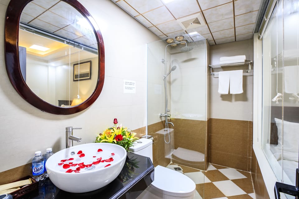 Shower, free toiletries, slippers, towels