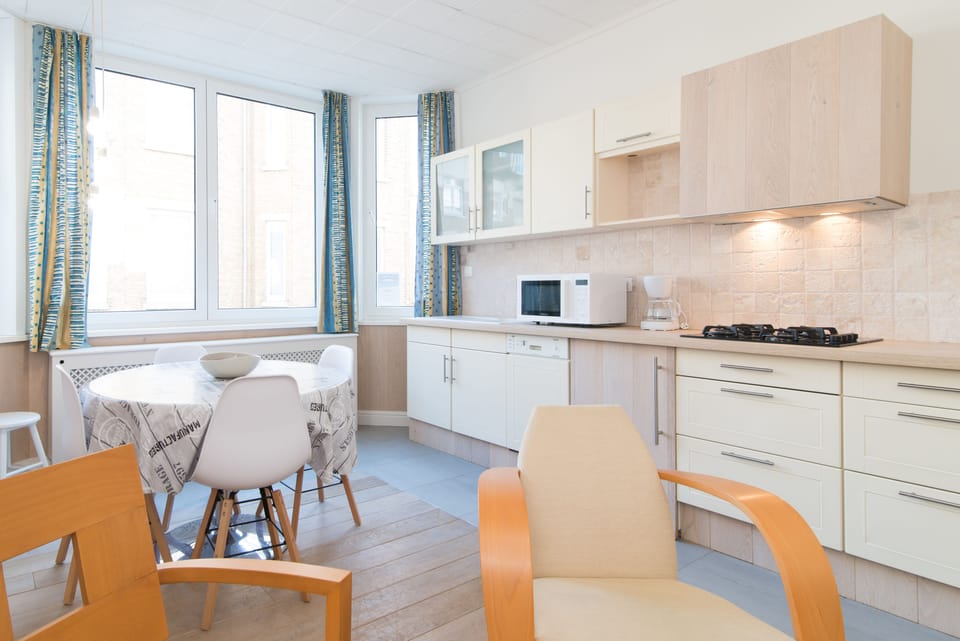 Comfort Apartment | Living area | TV