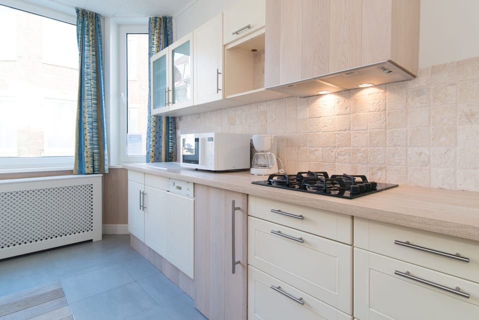 Comfort Apartment | Private kitchen | Fridge, microwave, stovetop, dishwasher
