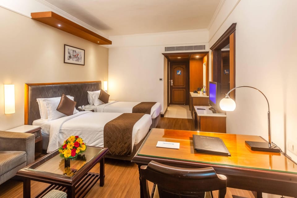 Executive Single Room | Minibar, in-room safe, desk, blackout drapes