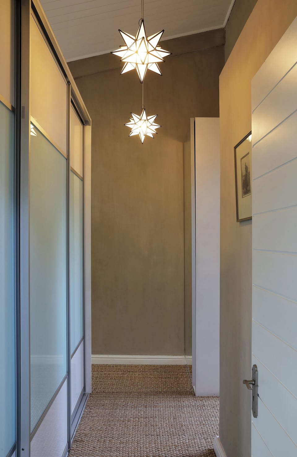 Dressing room of Main Bedroom 1, with the bathroom on the right