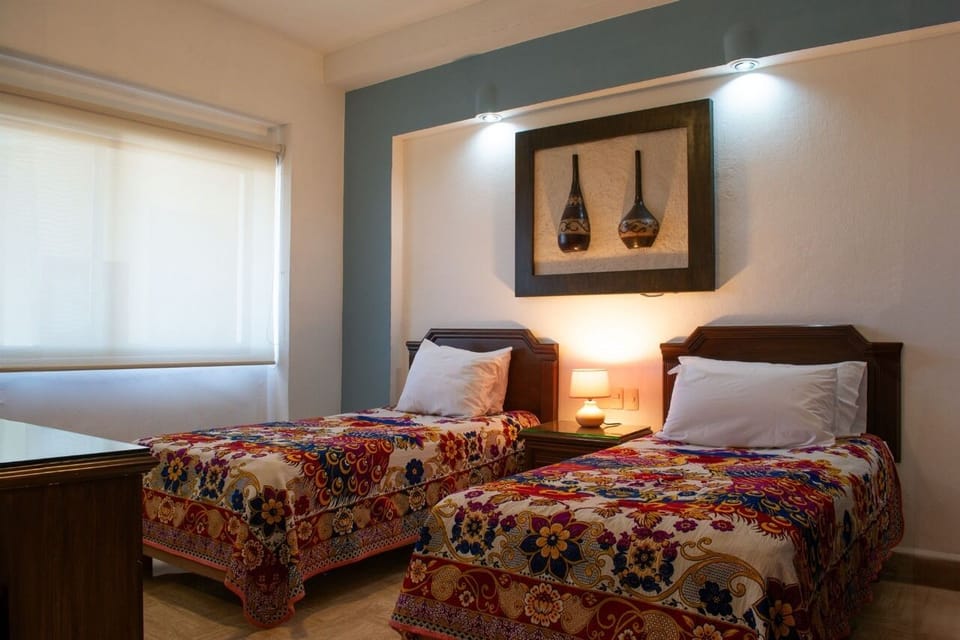 Twin beds can be put together before you arrive. 