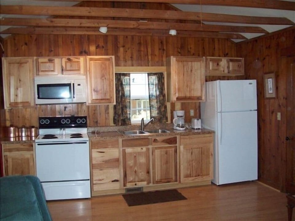 Kitchen/living room with full sized appliances.