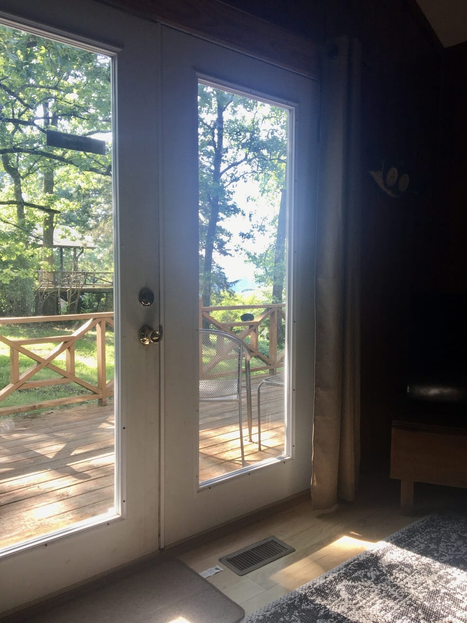 Look out the doors from the couch.  You can see the view from the couch.