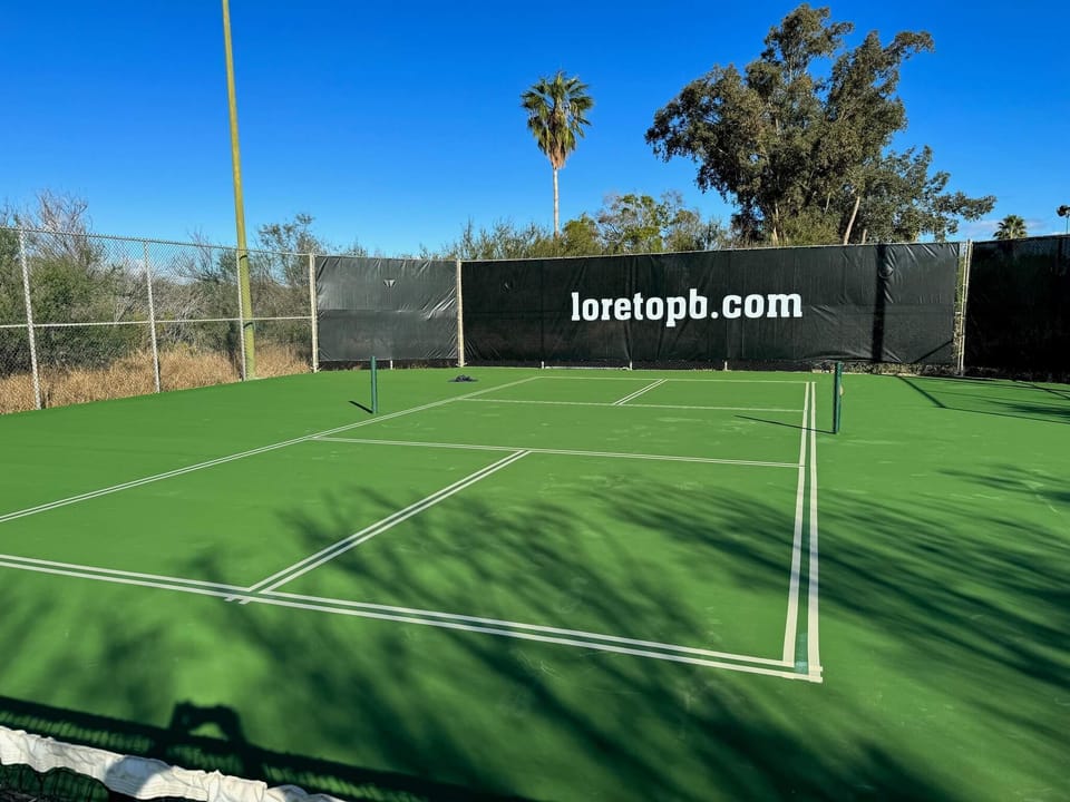 Guests play pickleball for free

