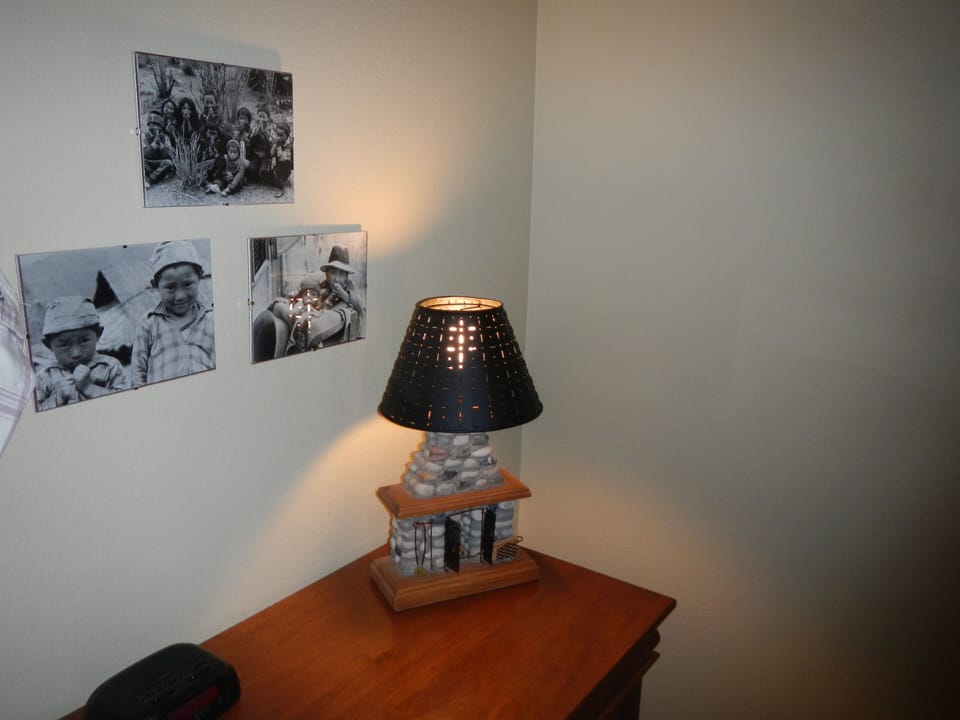 Den with available dresser.