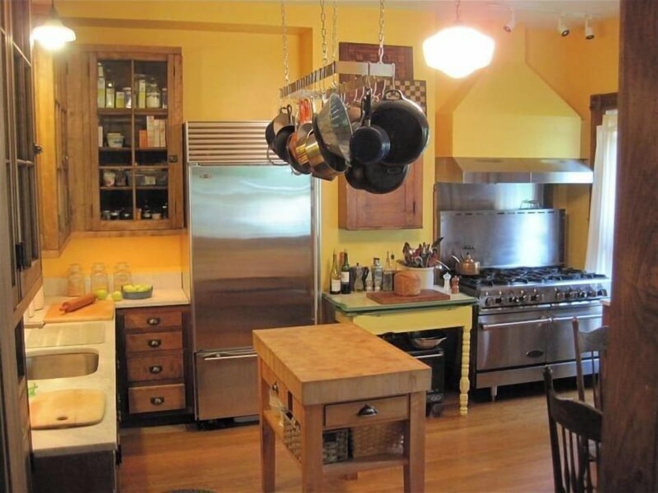Kitchen with commercial range - 8 burners, two ovens.