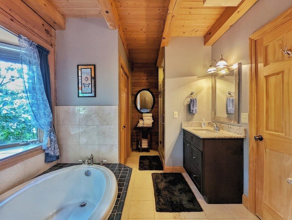 Main Level Primary Bathroom with Jetted Tub & Walk-in Shower