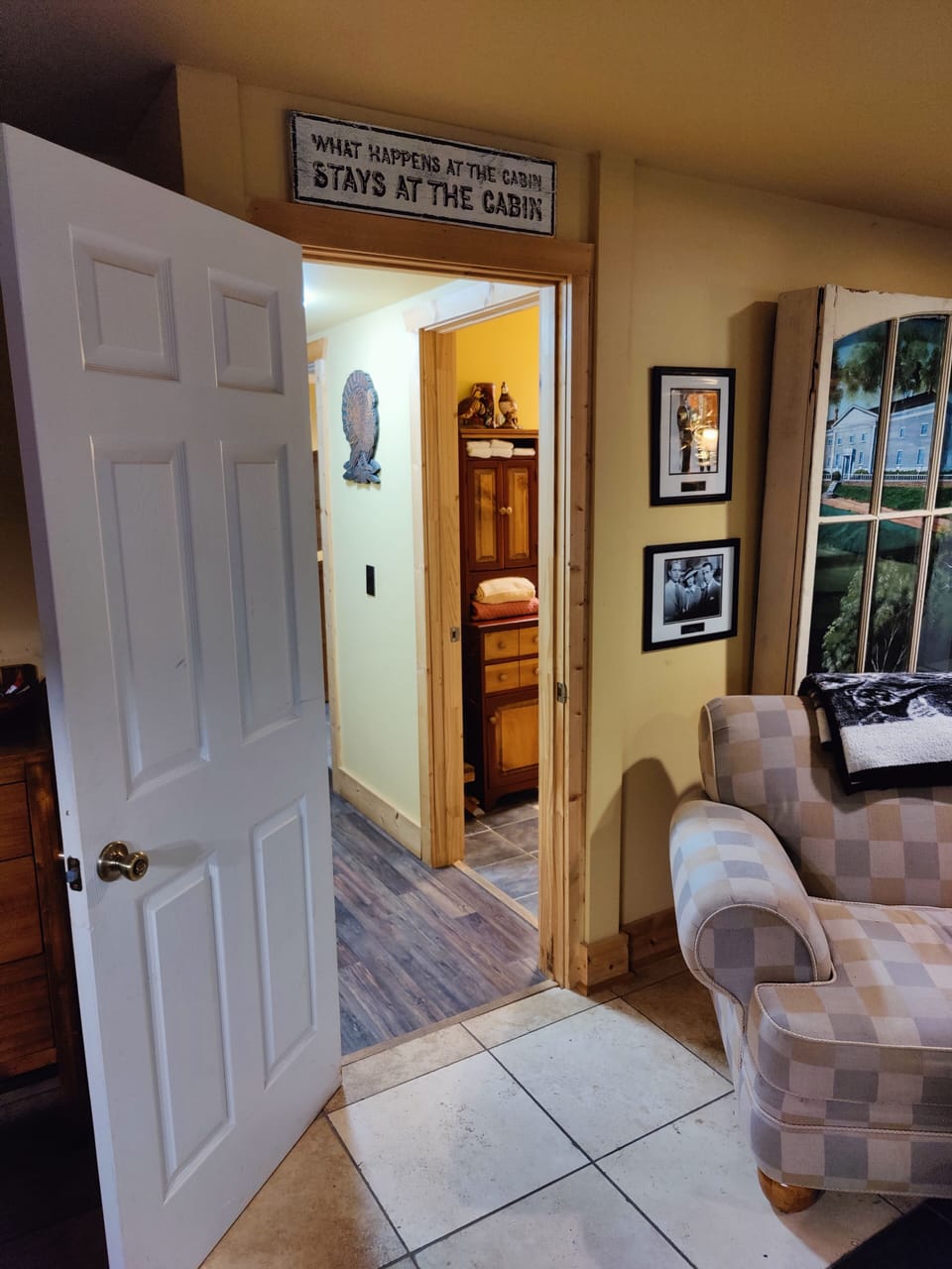 looking in on basement bath and bedroom from bar area