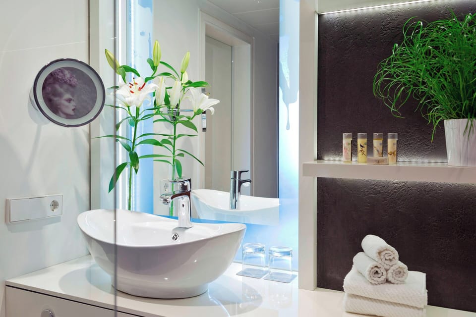 Rainfall showerhead, free toiletries, hair dryer, towels