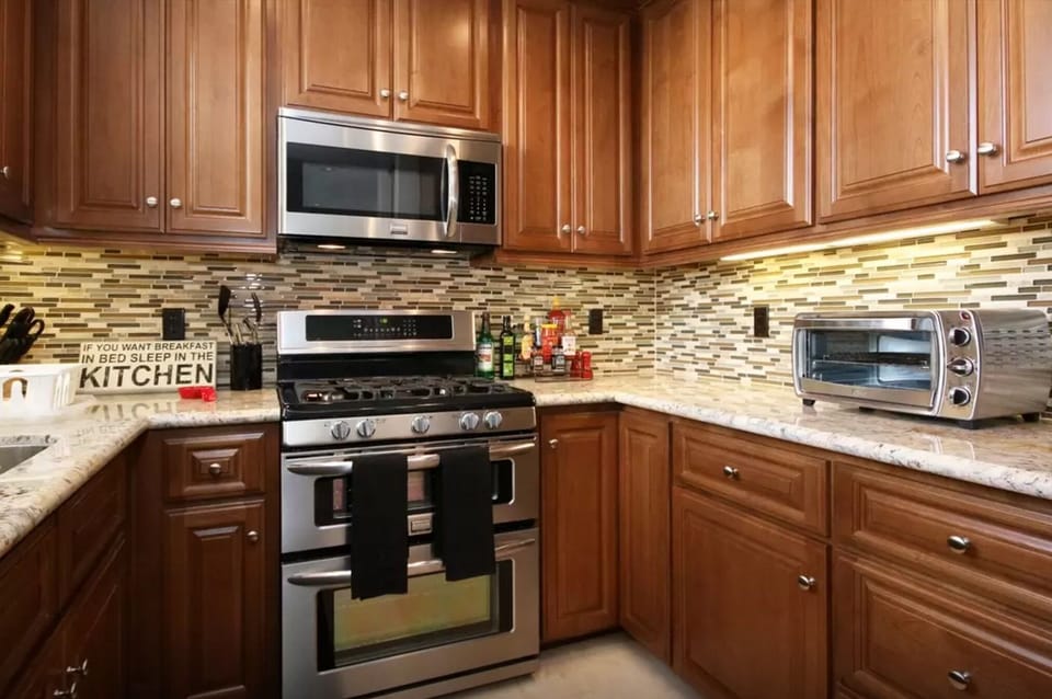 2nd Floor: Kitchen - Well Stocked | Dual Oven Gas Range | Toaster Oven and more.