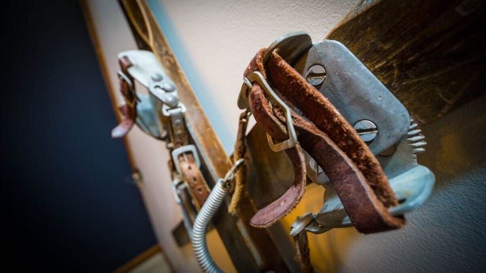 Antique skis in dining room, circa 1930