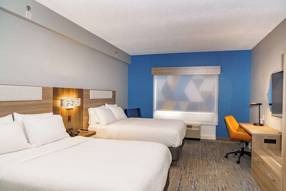 Standard Room, 2 Queen Beds | In-room safe, laptop workspace, blackout drapes, iron/ironing board