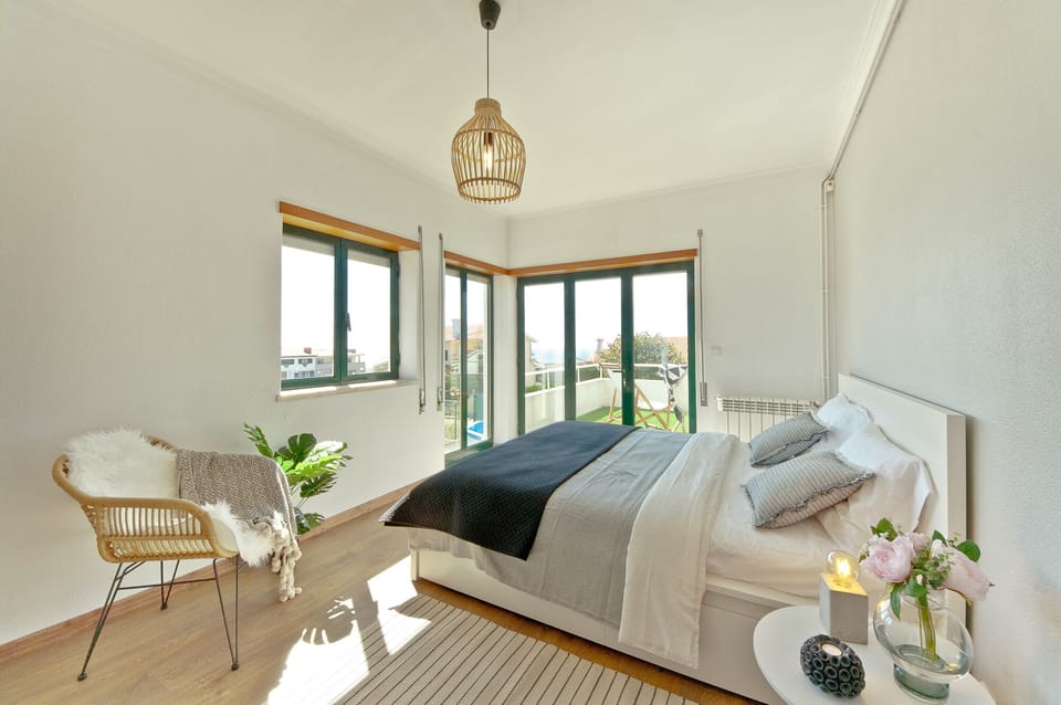 Master bedroom with in-suite bathroom. Sea and garden views