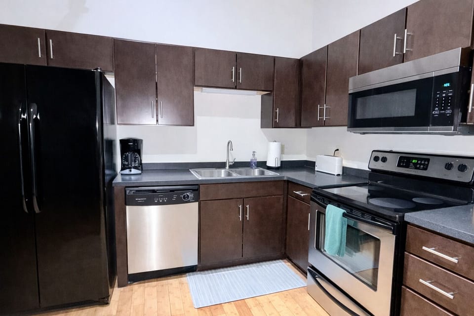 Full kitchen with standard drip coffee maker.