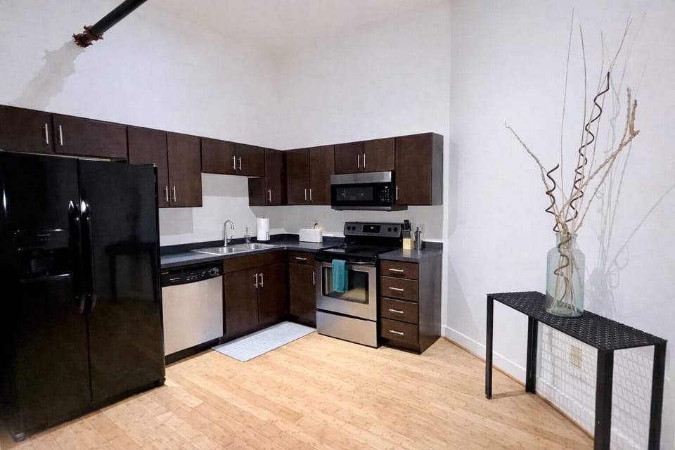 Full kitchen with standard drip coffee maker.