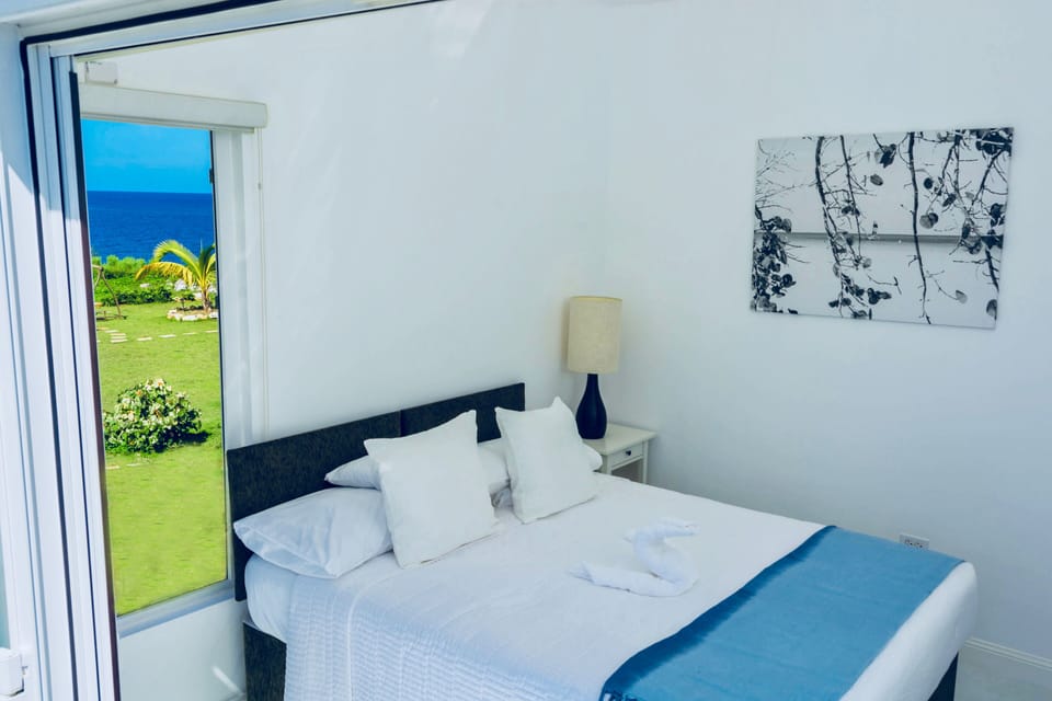 The Queen bed in the guest bedroom can be separated into two twin beds.